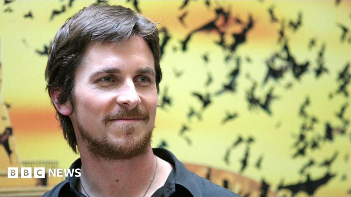 Christian Bale stood against a backdrop of bats during a "Batman Begins" Rome Photocall in Rome.