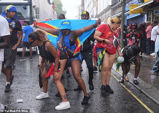 Those marching in Sunday's parade were undeterred, with one woman proudly holding the DR Congo flag
