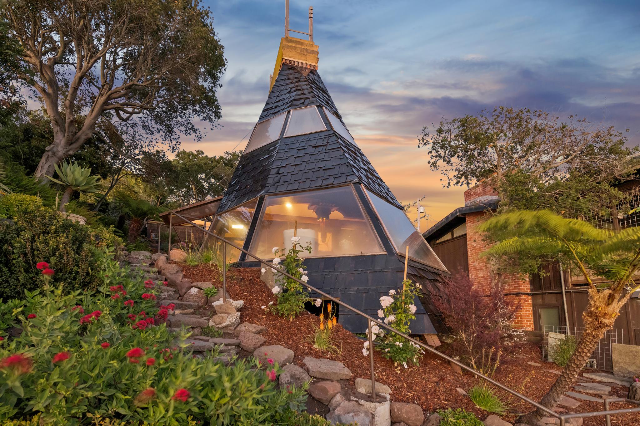 The unique home, made of amber-colored plexiglass and shingles, overlooks San Francisco Bay and is listed for $899,000