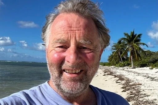 A man on an island foreshore.