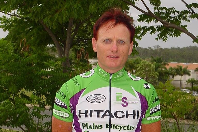 A person in a cycling outfit