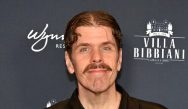 Perez Hilton against black background