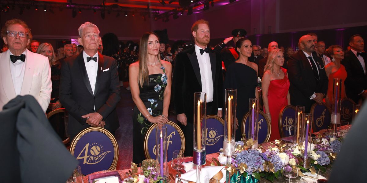 Insiders slap down claim Prince Harry's 'father figure' intentionally snubbed Meghan after awkward encounter
