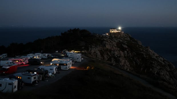 Spain dealing with influx of solar eclipse tourists while still battling wildfires