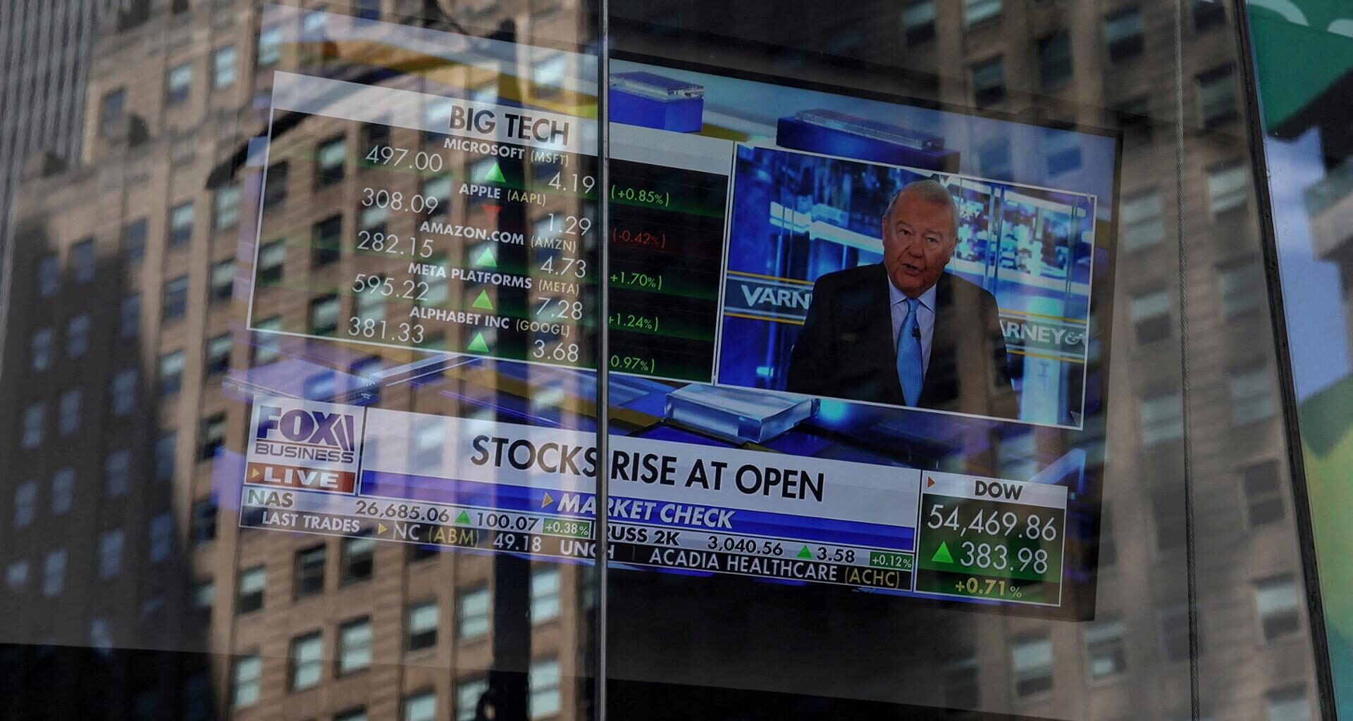 A screen displays trading information outside the Nasdaq Market site in New York City, Aug. 5. Reuters-Yonhap