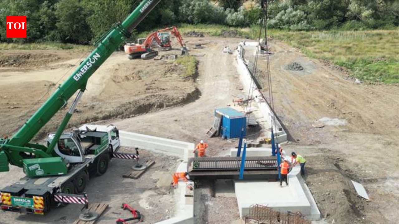 An English town installed a six-metre swing bridge whose deck contains the equivalent of 140 recycled plastic bottles per square metre and can be manually opened for passing boats