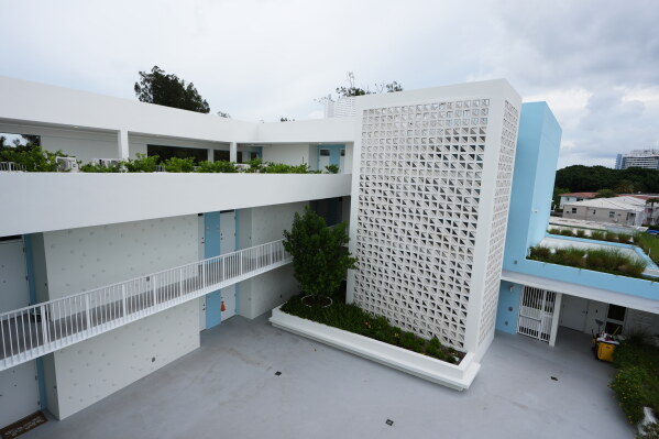The Vista Breeze affordable senior housing project, designed by the architectural firm Brooks Scarpa Huber, is elevated 10 feet from sea level, and is a real-world application of how to live with the threats of water Wednesday, Aug. 5, 2026, in Miami Beach, Fla. (AP Photo/Lynne Sladky)