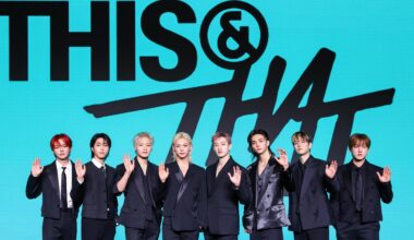 Members of K-pop boy band Stray Kids pose during a press conference for the release of the group
