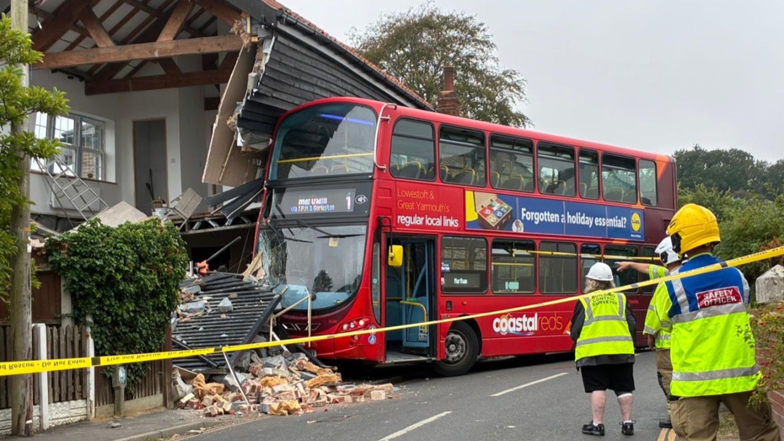 'It sounded like a bomb going off' Neighbours react after double decker bus crashes into home