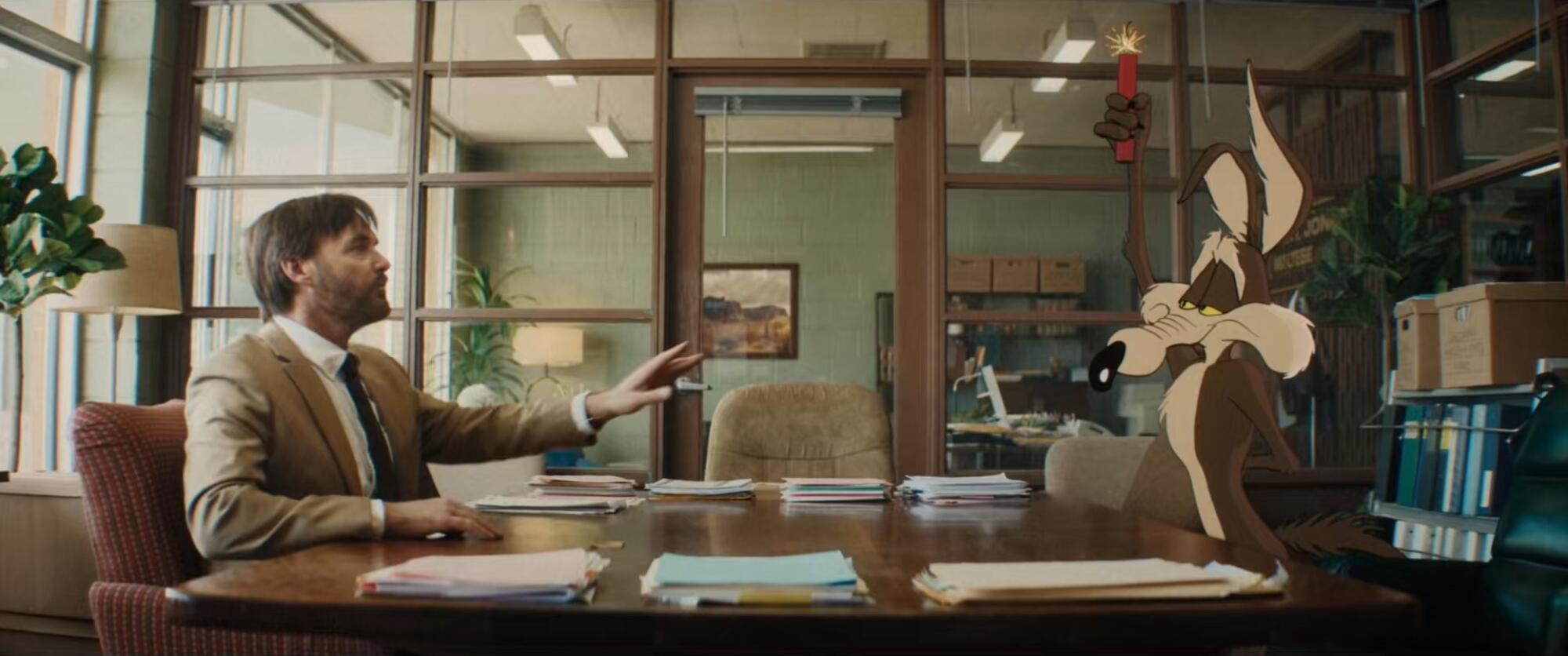 A lawyer speaks to an animated coyote in an office.