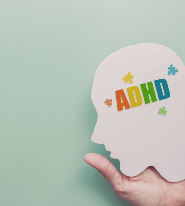 Hands holding brain with ADHD, Attention deficit hyperactivity disorder, mental disorder concept