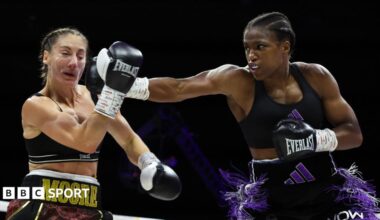 Caroline Dubois lands a punch on Amelia Moore