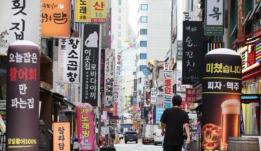 Restaurant and bar signs are seen along an alley in Jongno District, Seoul, Aug 17. Newsis