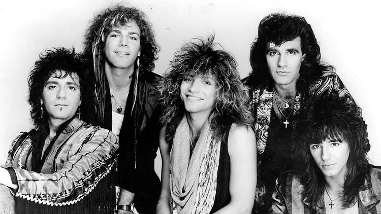 The Secret Weapon Behind 'Slippery When Wet' Wasn't Jon Bon Jovi or Richie Sambora: It Was Desmond Child, Bruce Fairbairn, and Bob Rock - Ultimate Guitar