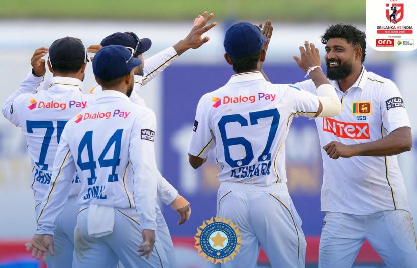 Sri Lanka's players celebrate a wicket Sri Lanka's players celebrate a wicket