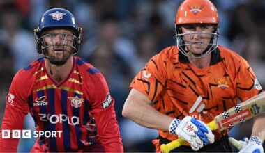 Manchester Super Giants wicketkeeper Jos Buttler (left) and Sunrisers Leeds batter Harry Brook (right) watch the ball after the latter hits a shot