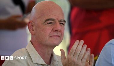 Gianni Infantino applauds during a ceremony in Colombia