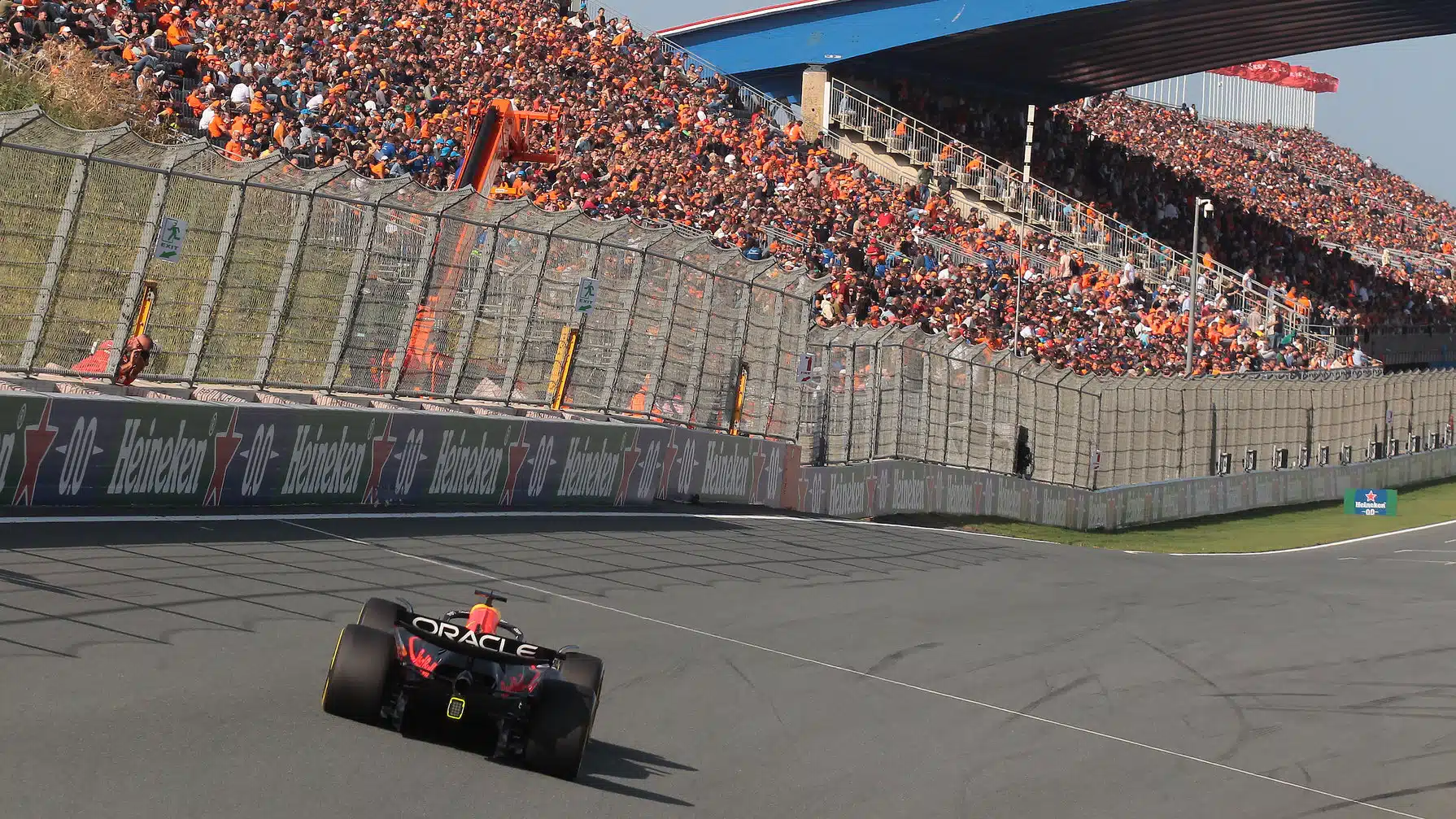 Max Verstappen (Red Bull-Honda) with orange army seen from behind in practice for the 2024 Dutch Grand Prix