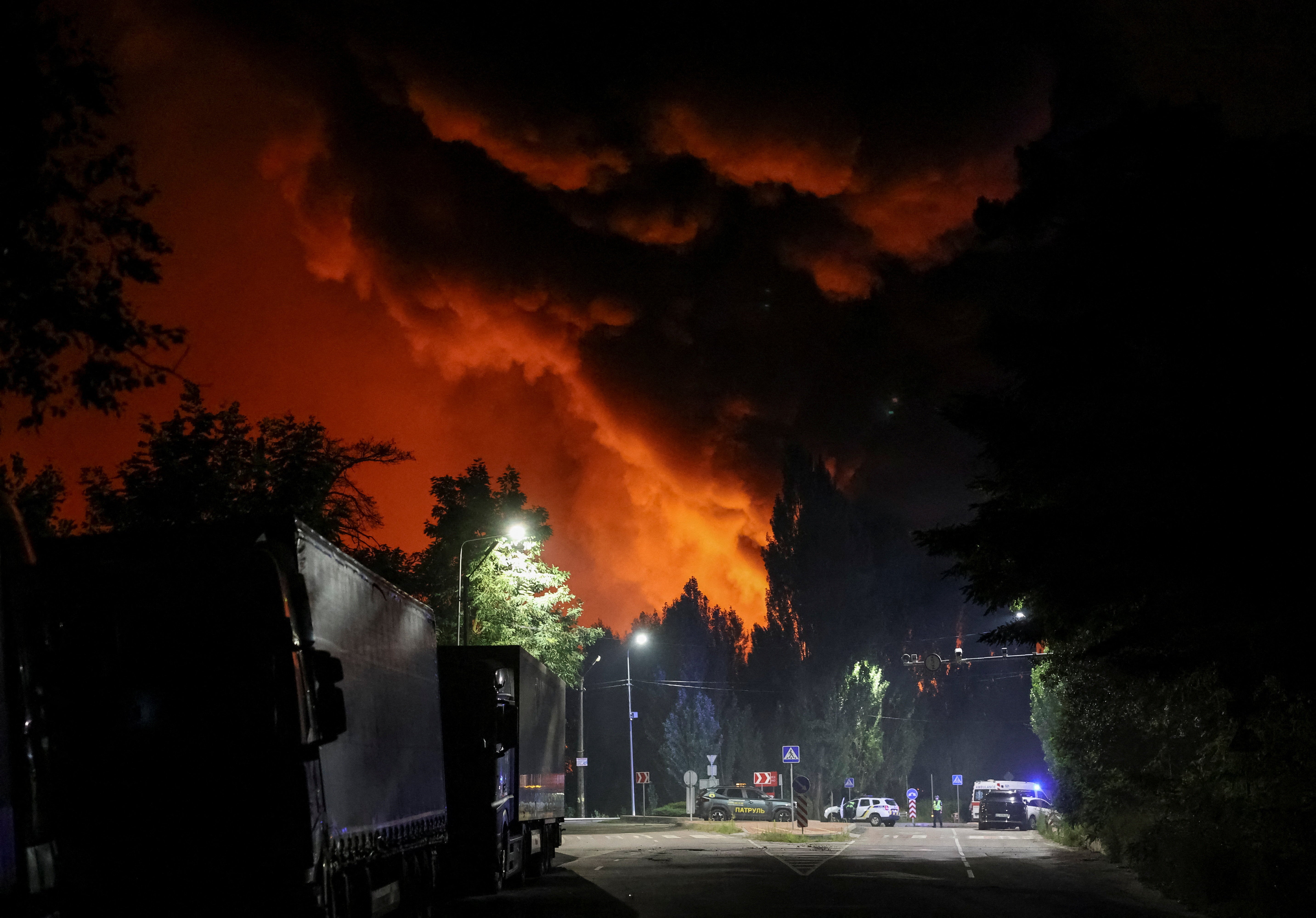 Smoke rises in the sky at a site of a Russian missile strike in Kyiv