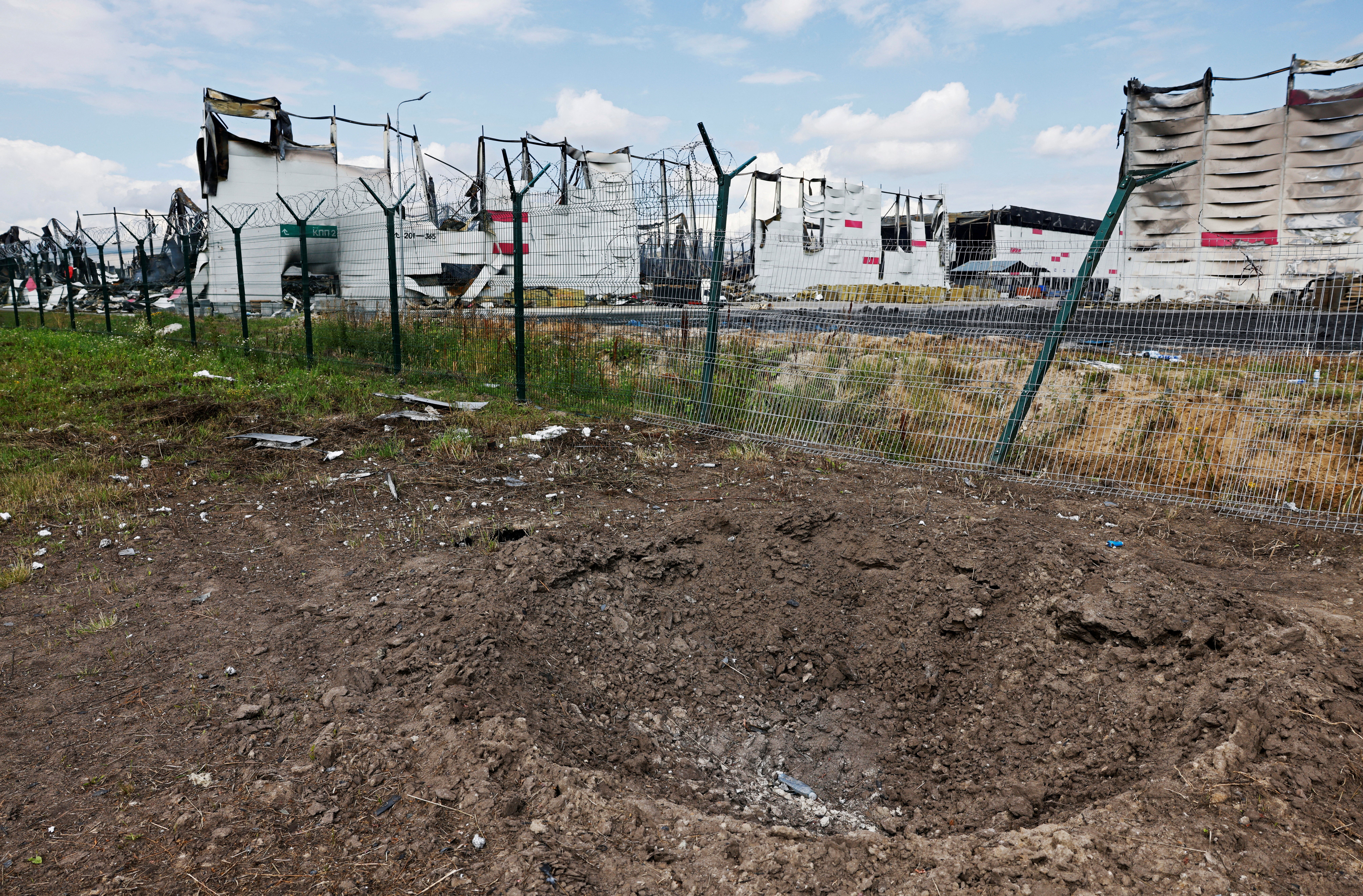 File: A crater near the remains of the Wildberries warehouse that burned down after a recent Ukrainian drone attack in the course of the Russia-Ukraine conflict, in the city of Elektrostal in the Moscow region, Russia, 23 July 2026