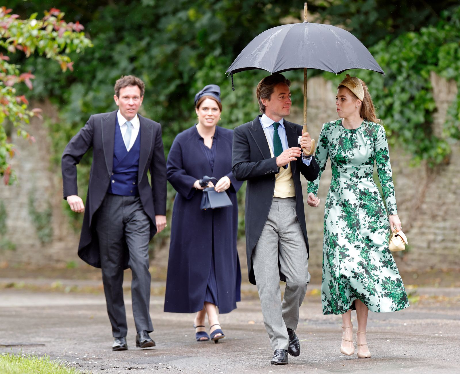 Image may contain Person Adult Clothing Pants Coat and People