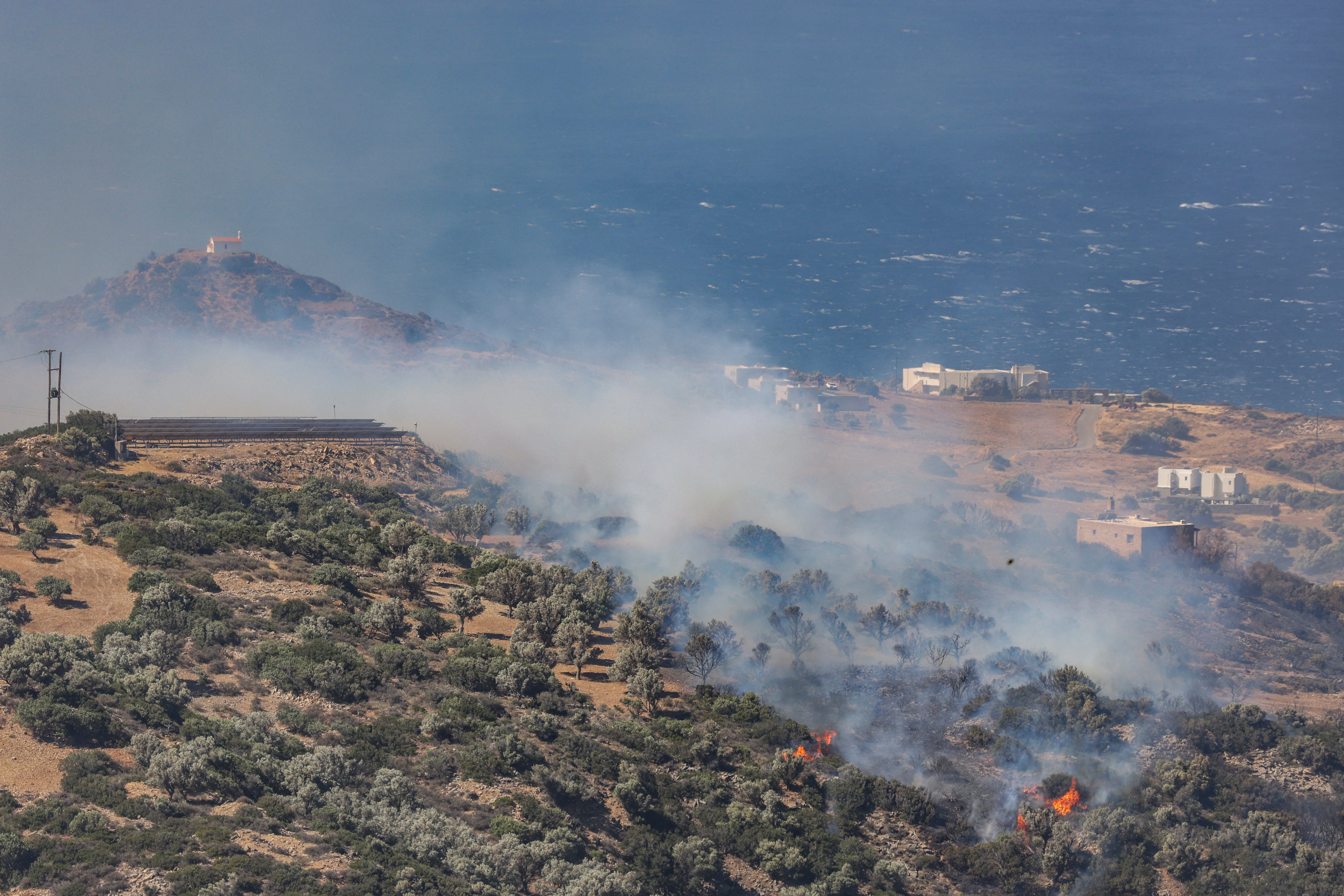 Three firefighters have died tackling a blaze on Crete