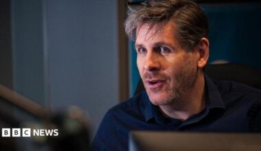 Tony Livesey broadcasting in a radio studio