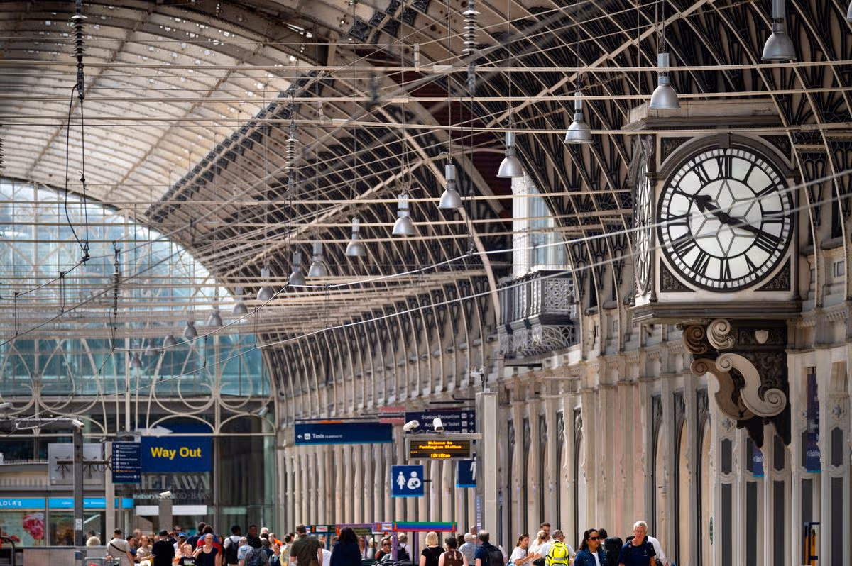 The ornate clock, roof and skylight of Paddington Station