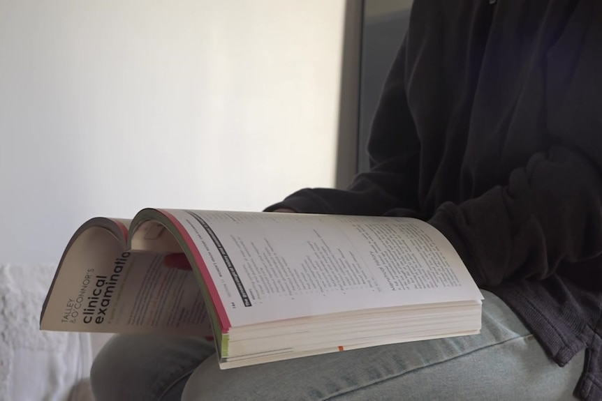 A man reading a book.