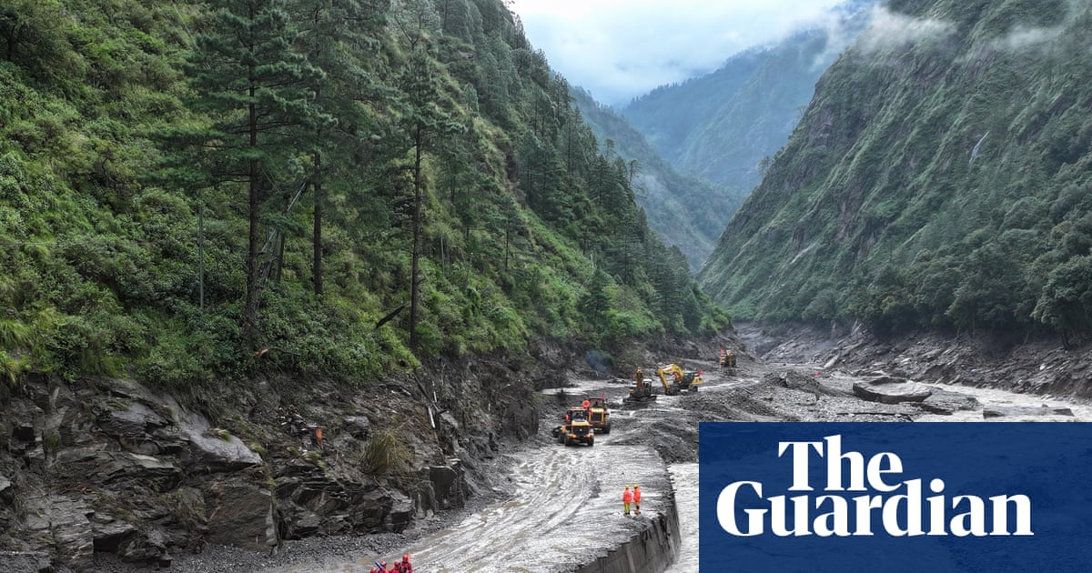 Overflowing lake halts rescue efforts as Nepal-Tibet flood death toll hits 469 | Nepal-Tibet flood disaster
