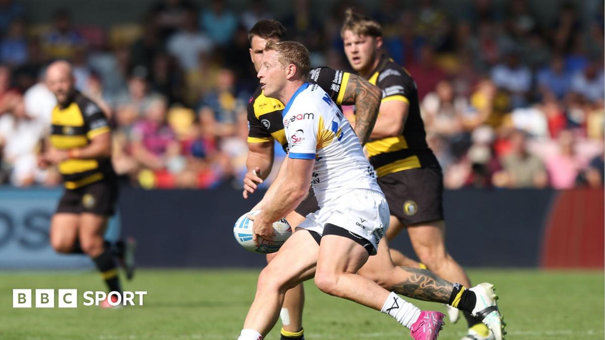 Lachie Miller looks for support to make a pass during the Super League match between York Knights and Leeds Rhinos