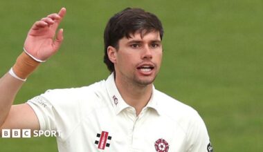 Justin Broad in a white Northamptonshire jersey during a match