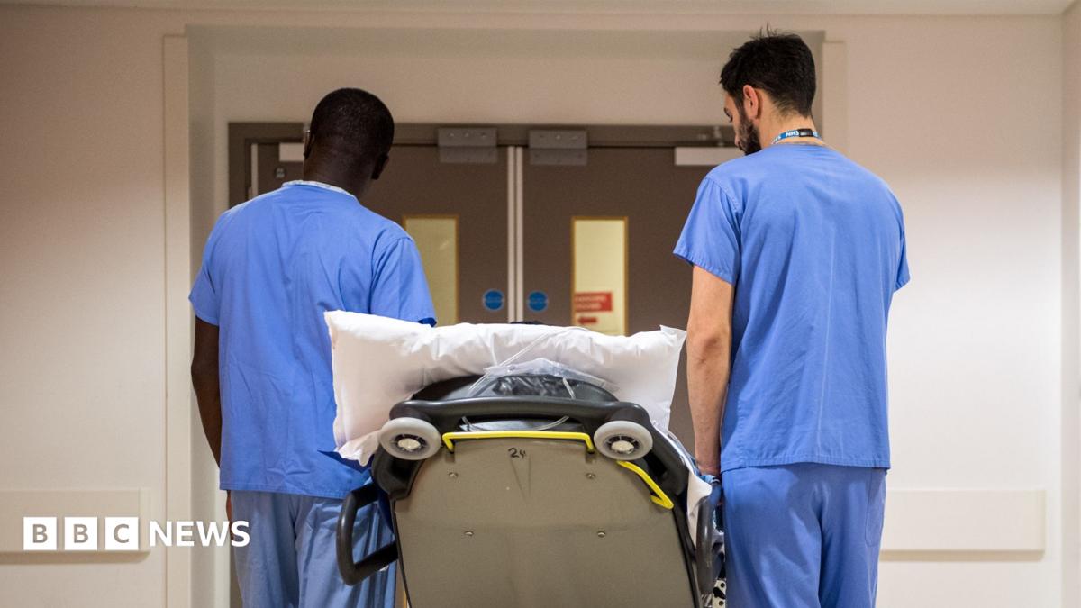 Medical staff walking in a hospital corridor