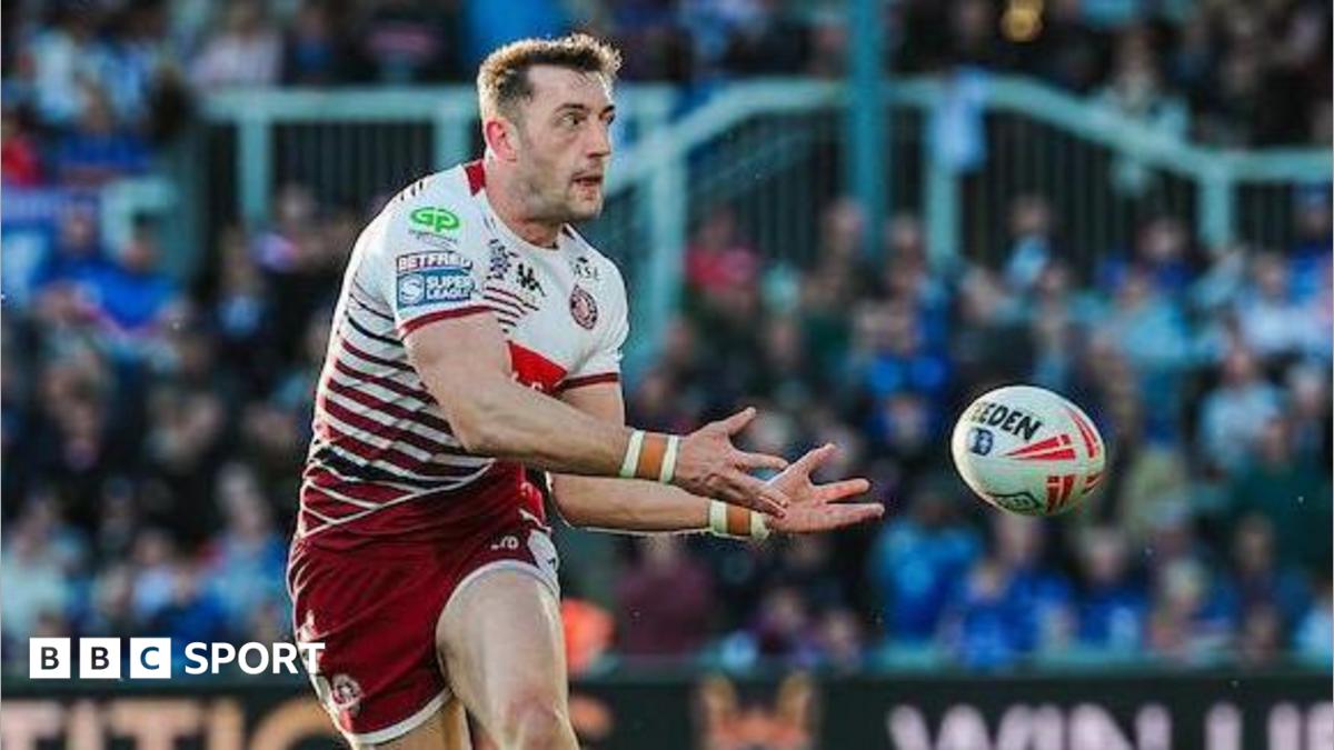 Jake Wardle of Wigan Warriors passing the ball.