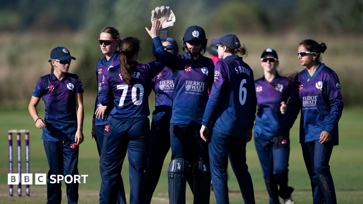 Scotland players celebrate a wicket against the Netherlands