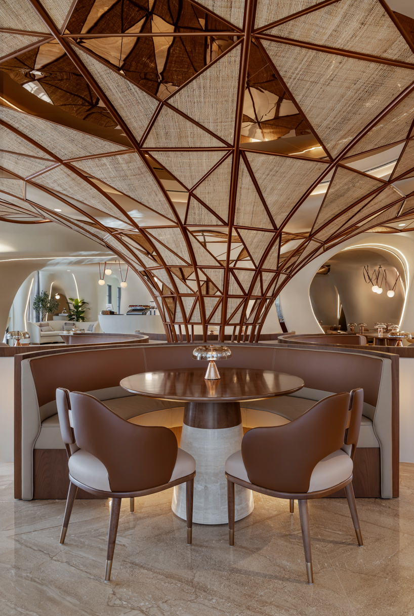 falwa restaurant transforms arabian equestrian heritage into fluid architectural interior - 5