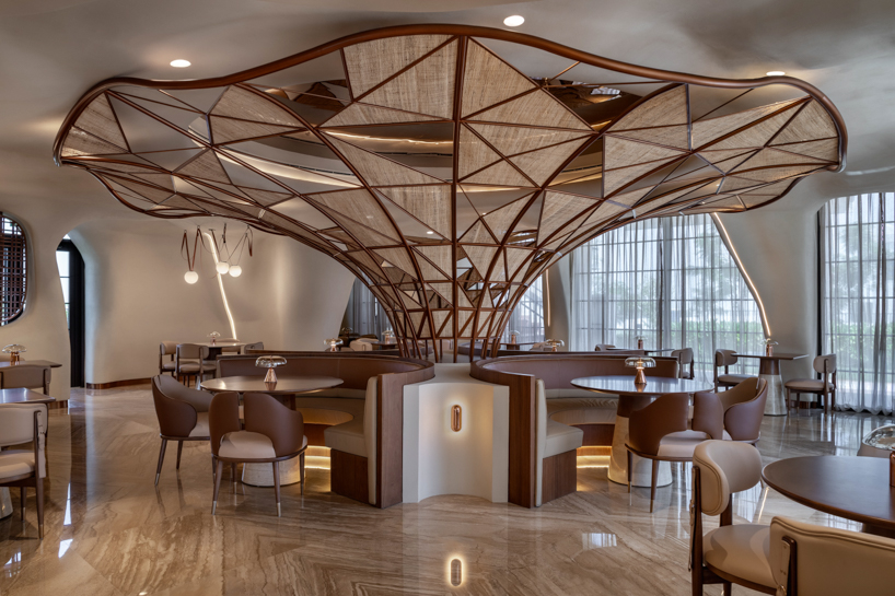 falwa restaurant transforms arabian equestrian heritage into fluid architectural interior - 1