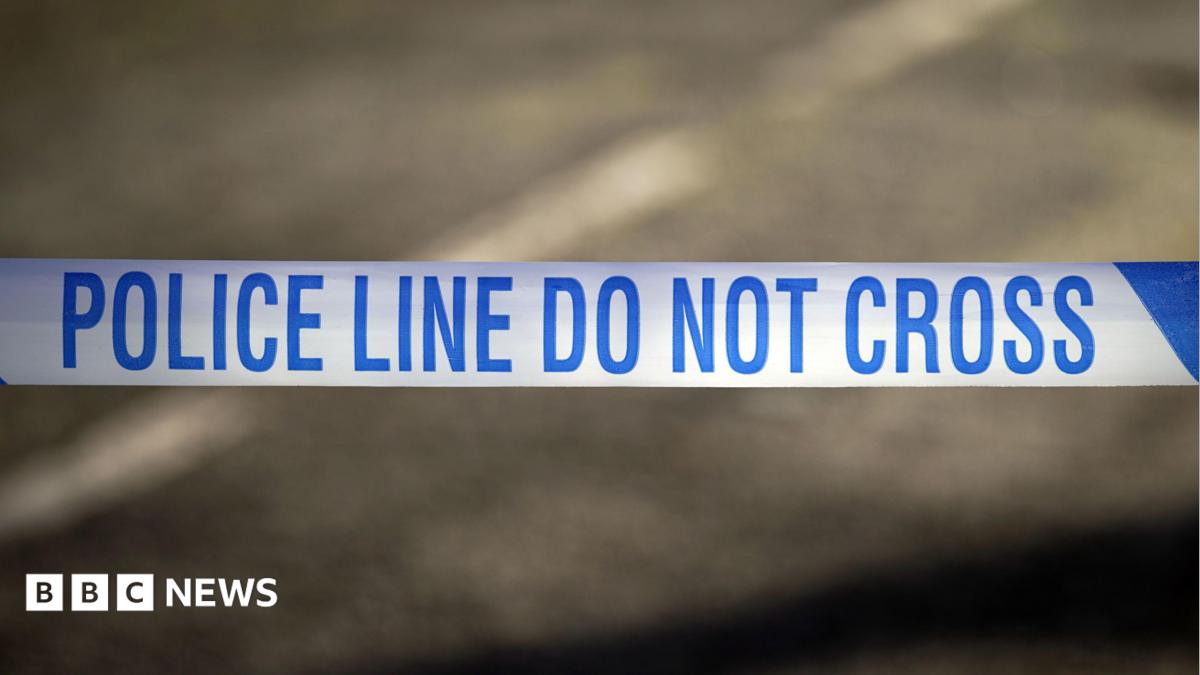 Police tape reading 'Police line do not cross'