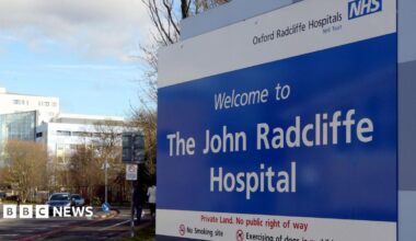A big sign saying 'Welcome to The John Radcliffe Hospital'