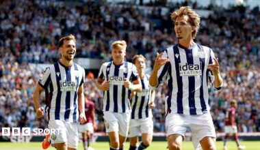 A smiling Isaac Price celebrates West Bromwich Albion's second goal with his team-mates against Burnley at The Hawthorns