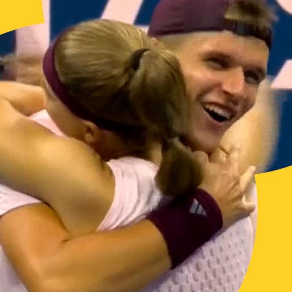 Mensik and Muchova hug each other