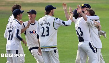 Yorkshire players mob stand-in skipper Dom Bess after a wicket