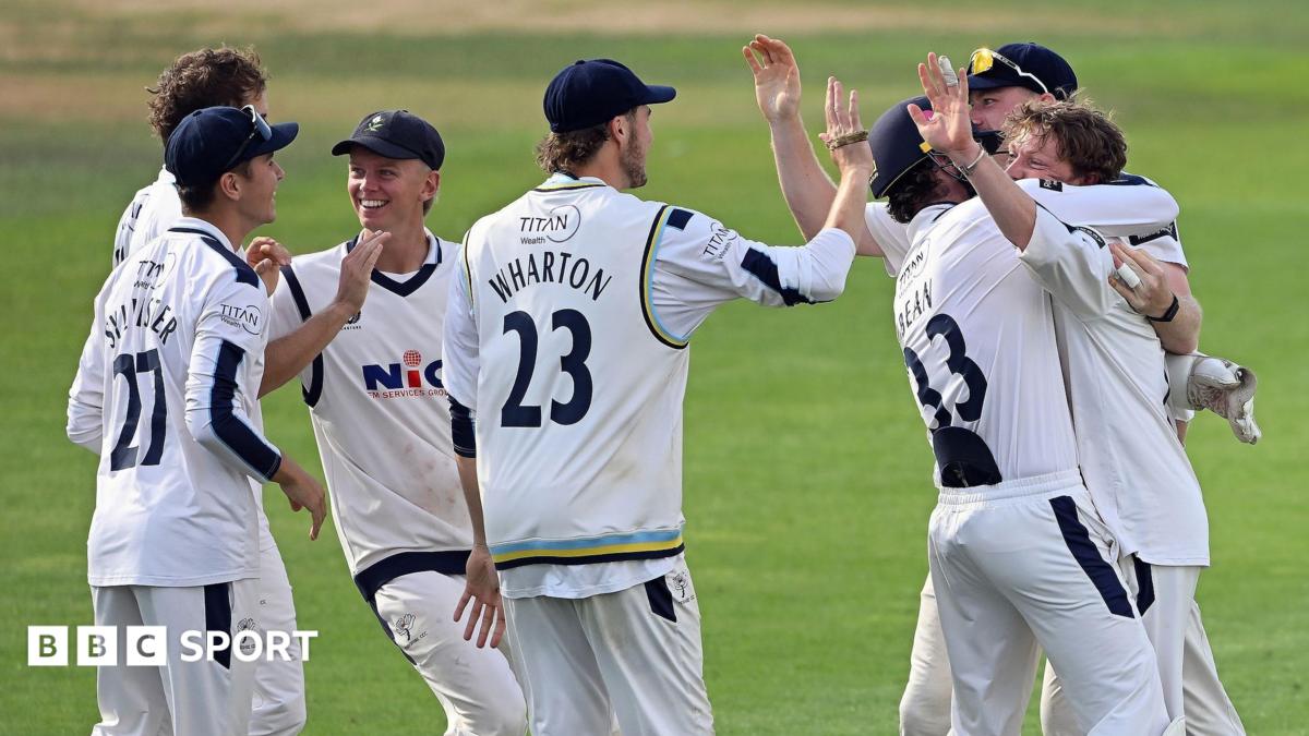 Yorkshire players mob stand-in skipper Dom Bess after a wicket