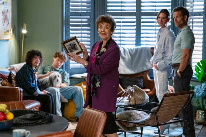 570241,TITLE:Eastenders Jodie, Ryder, Rose, and Gemma Hawkins with Ned Roper in Nicola's living room in EastEnders.