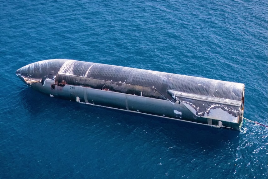 A floating spaceship is seen in waters.