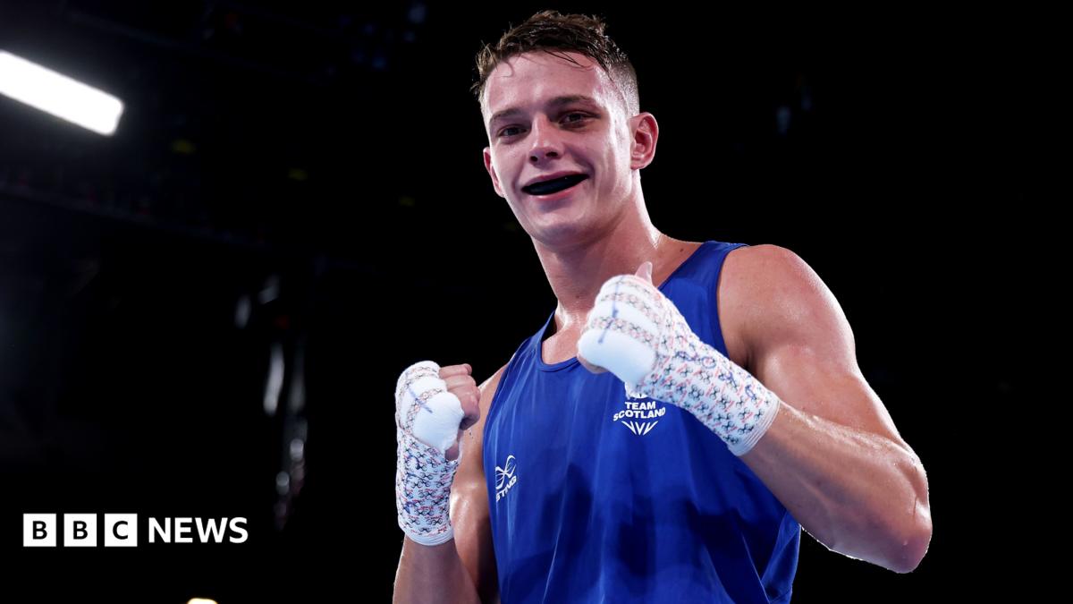 Sonny Kerr of Team Scotland poses for a photo after victory against Marion Ah Tong of Team Samoa in the Men's 70kg Quarter-Final match on day six of the Glasgow 2026 Commonwealth Games