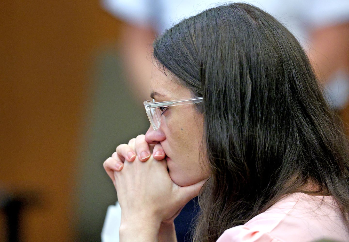 Defendant Lindsay Clancy listens to Dr. Jennifer Tufts on the witness stand during her murder trial at Plymouth Superior Court in Plymouth, Mass., Monday, Aug. 10, 2026. 