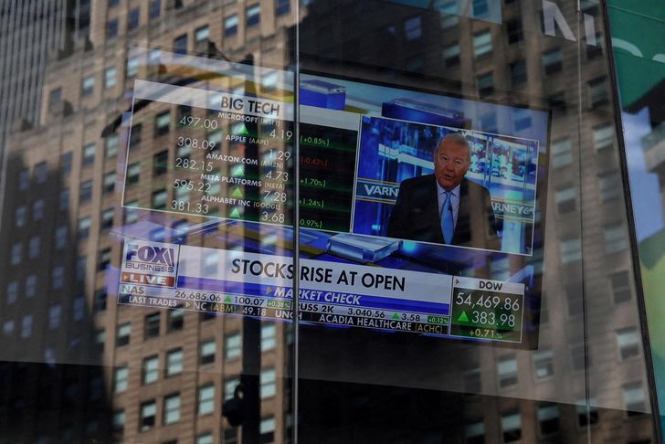 A screen displays trading information outside the Nasdaq Market site in New York City, Aug. 5. Reuters-Yonhap