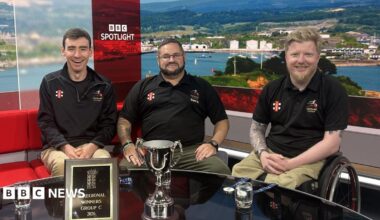 Ben Mailes, Dan Tonkin and Mark Stevens from the Cornwall Super 9s sat in the BBC Spotlight studio. They are all looking at the camera and are smiling.