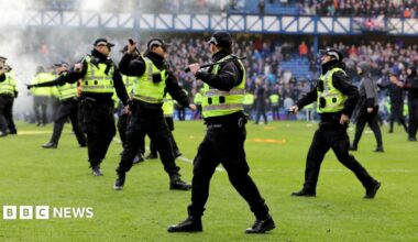 Officers had to keep rival fans apart after the final whistle following Rangers' Scottish Cup match against Celtic at Ibrox in March